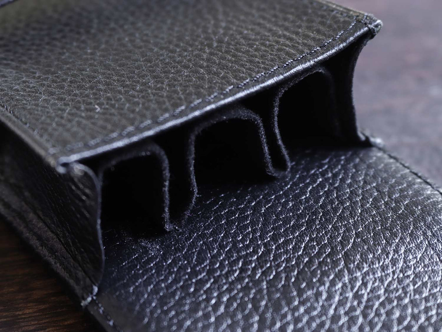 Premium handcrafted Terasaki Leather Pen Case - Black, using ancient Javanese leather crafting methods for a luxurious and sustainable writing accessory.