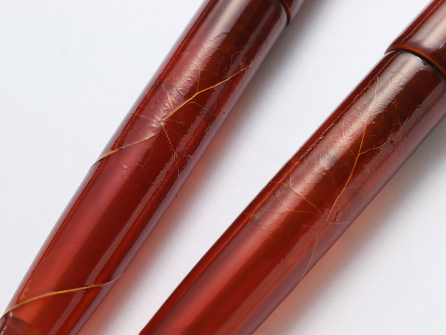 Close-up of two Urushi lacquer fountain pen on a white background | Wancher Dream pen