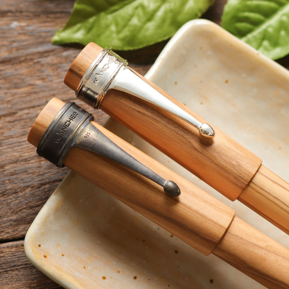 World tree olive wood fountain pen from Wancher using silver and matte pen clip close-up