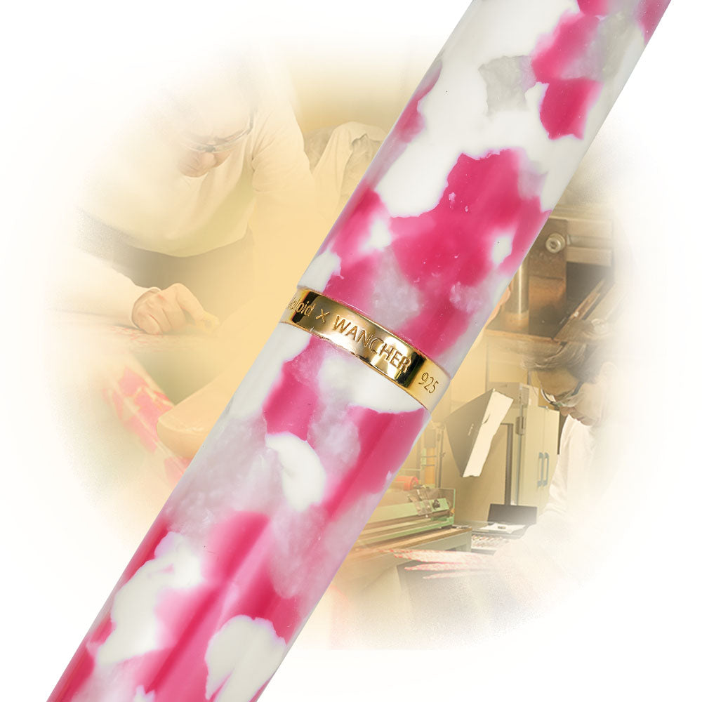 Dream Pen Celluloid SAKURA fountain pen crafted using original Japanese roll-up technique close up on the 925 sterling silver gold ring 